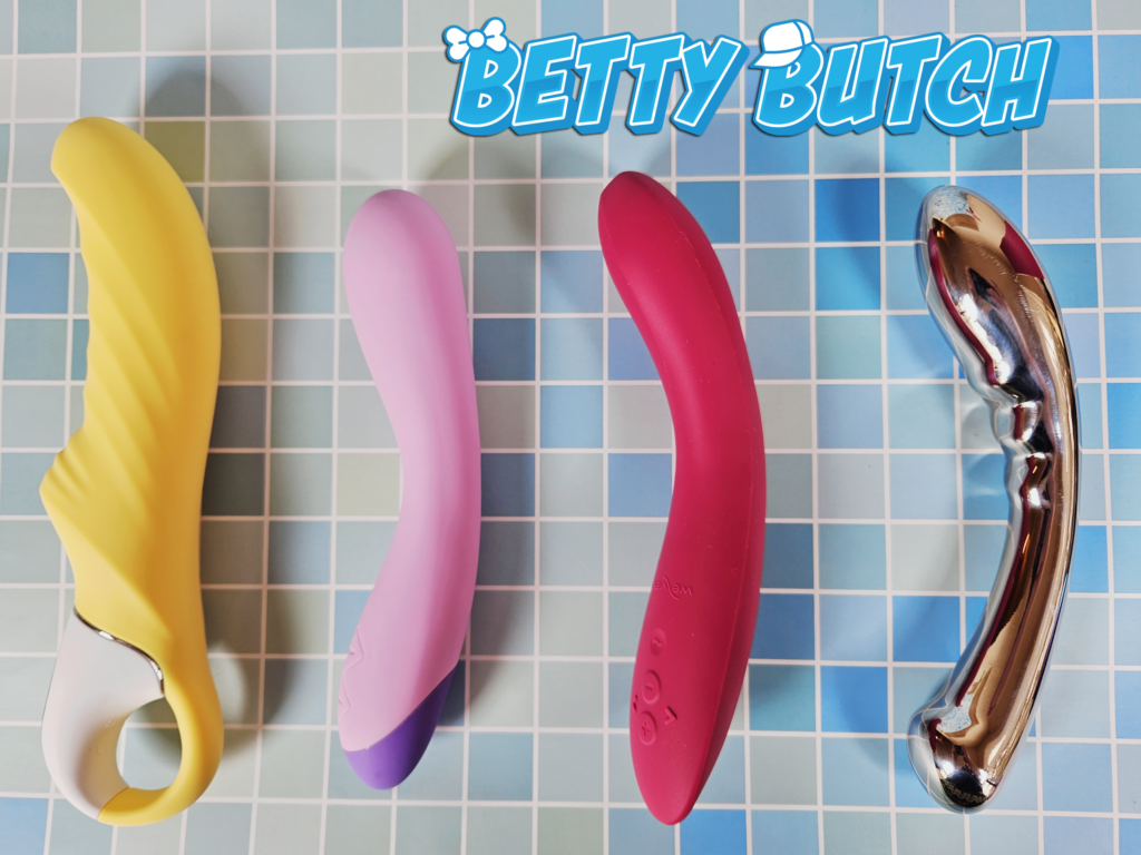 The We-Vibe Rave 2 Adjustable G-Spot Vibrator laying beside the Satisfyer Yummy, Blush Wellness G Curve, and Le Wand Arch.
